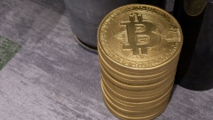 Novelty Bitcoin tokens arranged at a CoinUnited cryptocurrency exchange in Hong Kong, China, on Friday, March 4, 2022. Bitcoin fell below $38,000 on March 8, touching its lowest price in a week, as global markets tumbled on concerns that spiraling commodities prices unleashed by Russia's invasion of Ukraine may have a wider and longer-lasting impact than previously thought. Photographer: Paul Yeung/Bloomberg